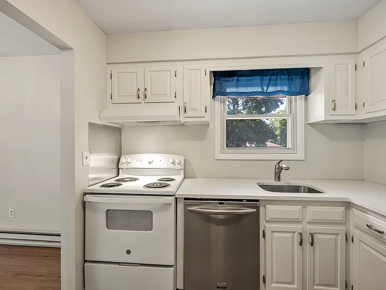 Bright White Kitchen with Window
