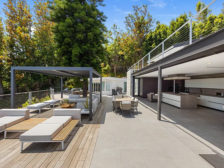 Perfect for outdoor living with alfresco dining areas, sunbathing spots, and an outdoor kitchen.