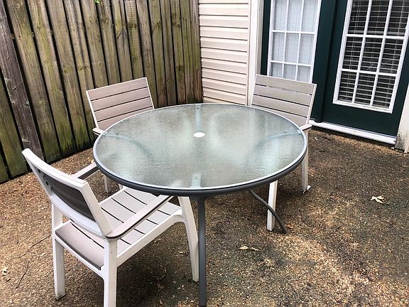 Fenced-in patio. Patio furniture to stay with condo.