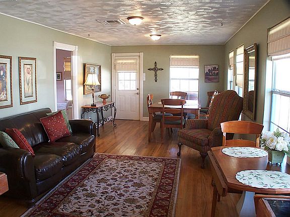 This shows dining and den combo