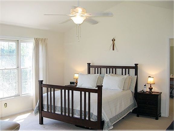 Master bedroom with cathedral ceiling