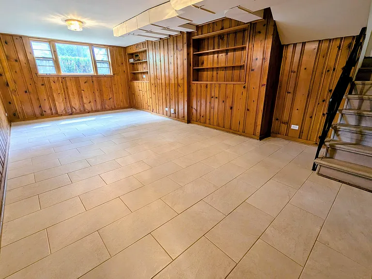 Daylight Lower Level - Full Sized Windows and Perfect for a Home Gym, Media Lounge, Expansive Playroom, or a Quiet Hybrid Office Space