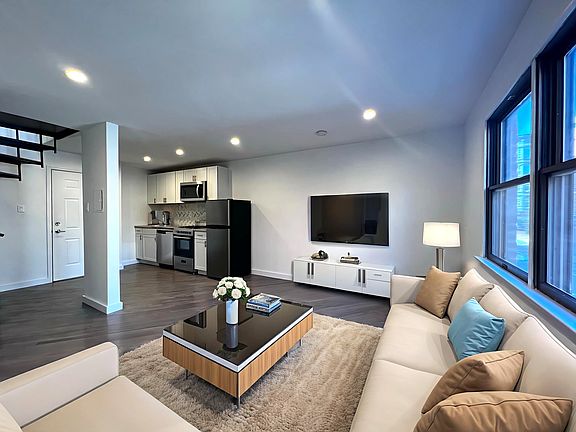 Photo virtually staged to show possible layout options (first floor)