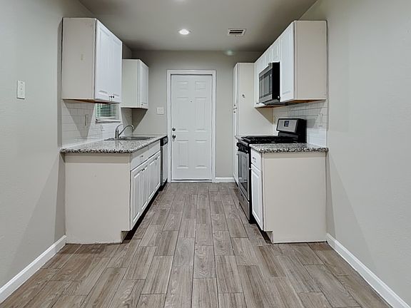 Spacious kitchen with neutral