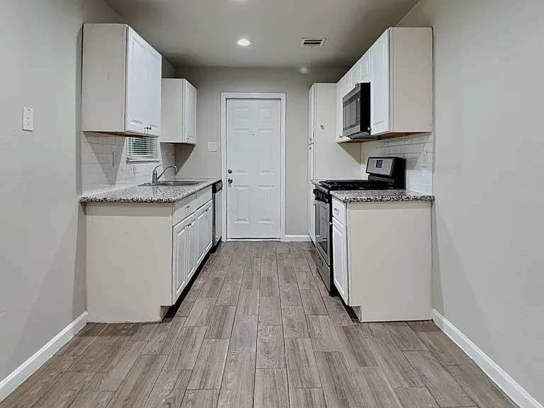 Spacious kitchen with neutral