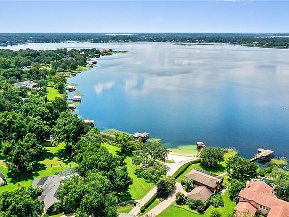 Community sits along Lake Down with a Private Boat Ramp and Beach for Residents