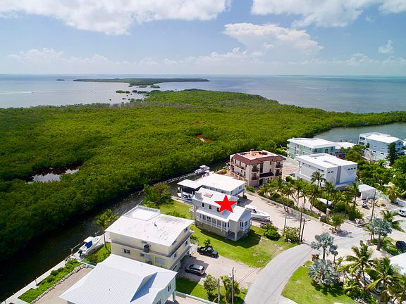 5th image of 348 S Coconut Palm Blvd