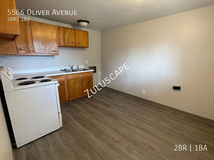 5566 Oliver Ave. / 2 bed 1 bath duplex with fenced yard — Photo 3