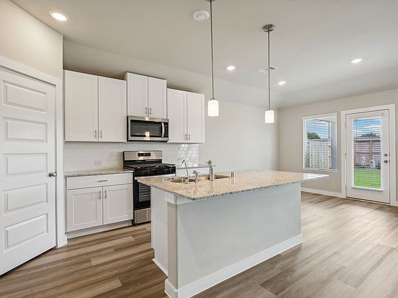 Kitchen of 6450 Brazos Trail Drive at Wall Street Village in Richmond, Texas.