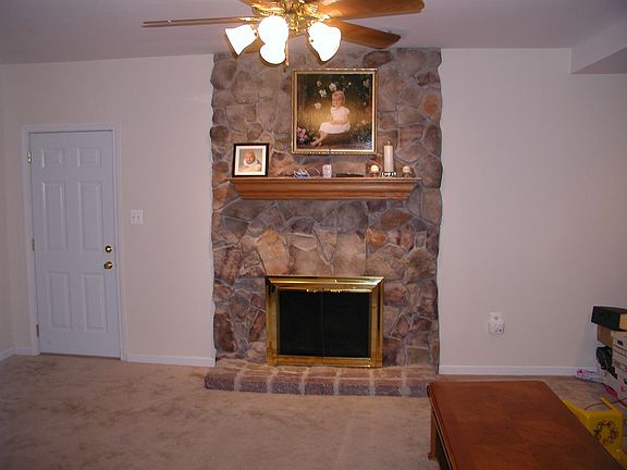 Family room w/ stone fireplace