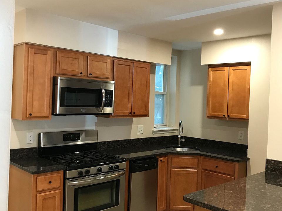Kitchen with granite counters and stainless steel appliances