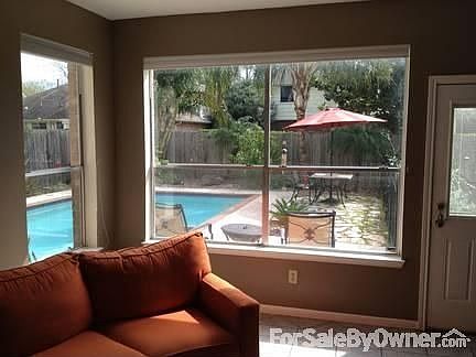 Den overlooking pool
						:
						Hummingbird & butterfly garden around the sparkling pool