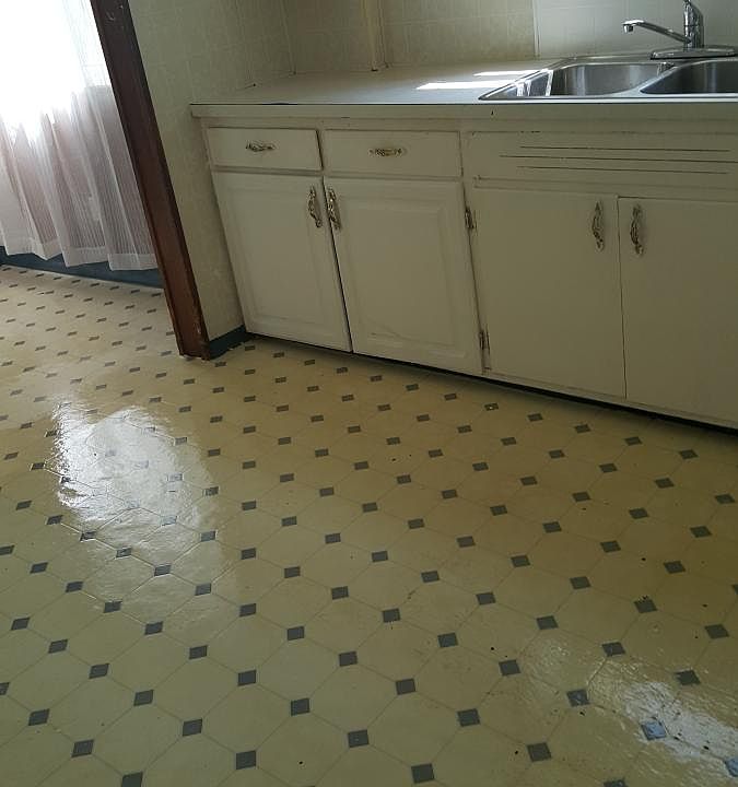 Kitchen with backroom eating area