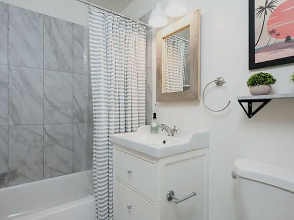Renovated bathroom in the main house. Photos of the renovated suite bathroom coming soon