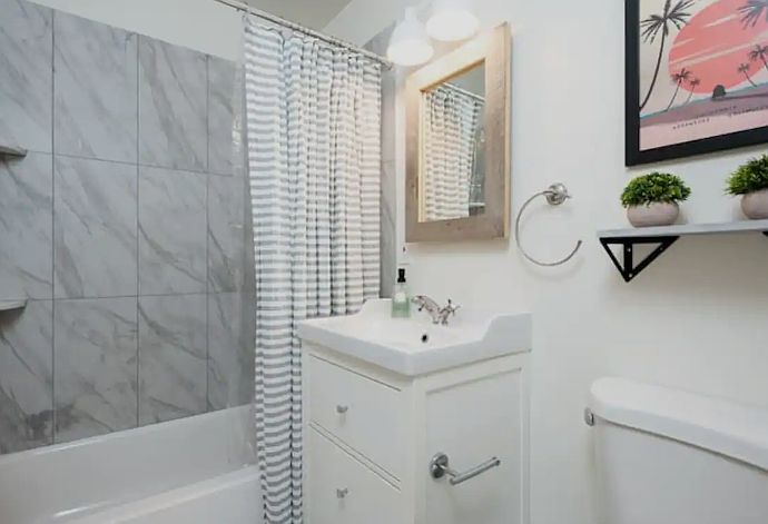 Renovated bathroom in the main house. Photos of the renovated suite bathroom coming soon