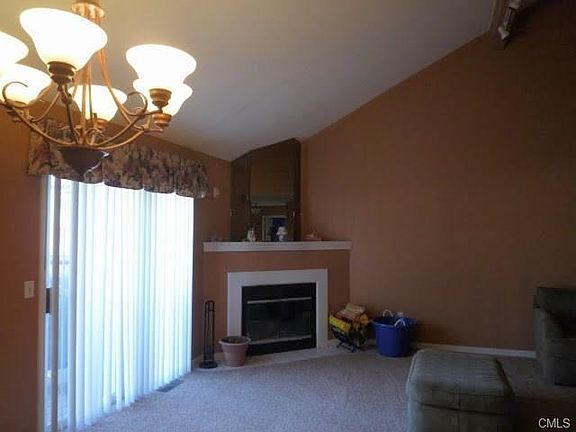 Large living area/great room with access to a deck