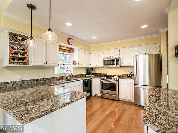 Kitchen with granite counters and HW floor