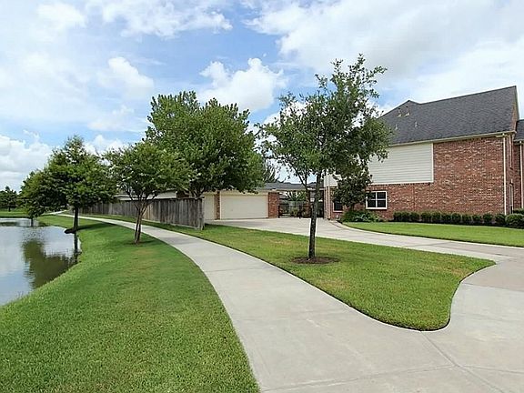 The home has no neighbors on the left side where there is a serene creek and walking trail. You'll l