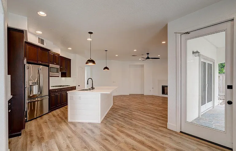 Kitchen is next to the family room