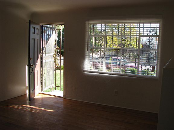 living room front door and window