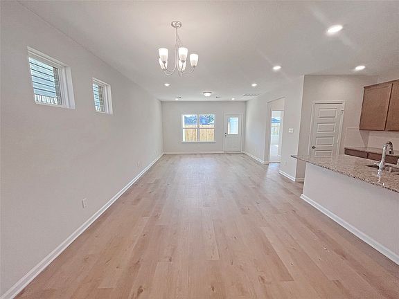 The Robin II- Dining Area into Family Room