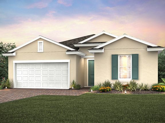 Home Exterior FM1A with shingle roof and decorative brick paver driveway