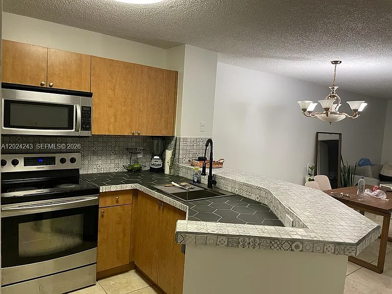8750 N Sherman Cir #208 — Photo 2
