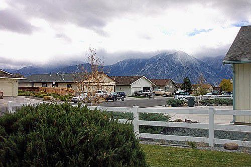 Spectacular mountain views from front yard, Side A.