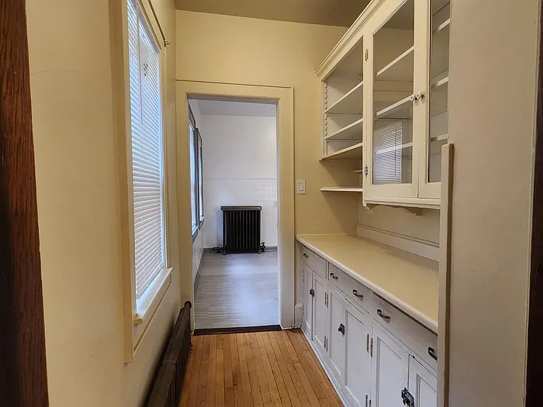 Pantry/Storage hall #1 leading from dinning room to kitchen.