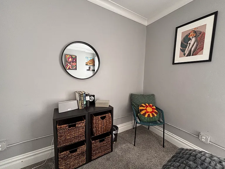 Natural light fills the room, highlighting its spacious layout and ample closet for all your storage needs. Perfectly crafted for relaxation and convenience, this bedroom is a serene retreat.
