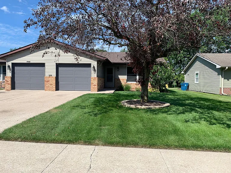 Front of home. Townhouse being rented is on the right.