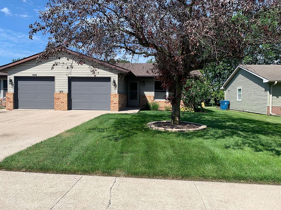 Front of home. Townhouse being rented is on the right.