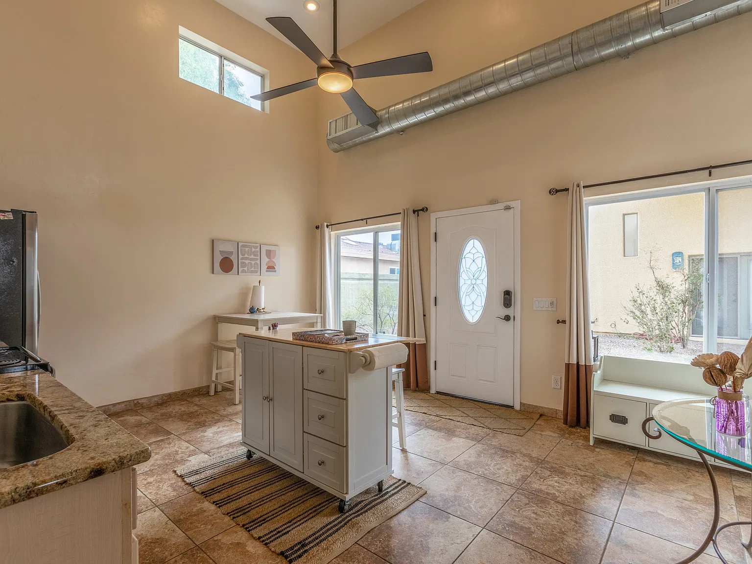 Front entry to kitchen and dining