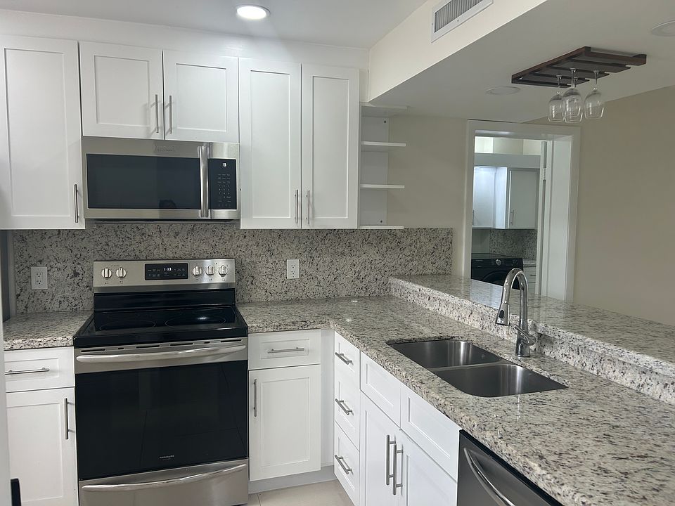 upgraded kitchen with newer appliances