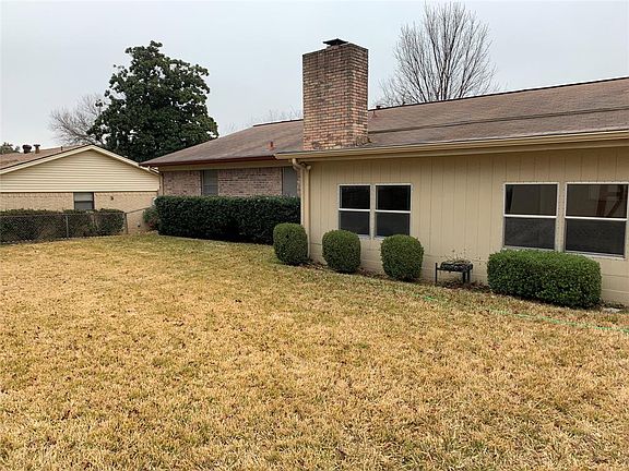 View of home''s exterior with a chimney