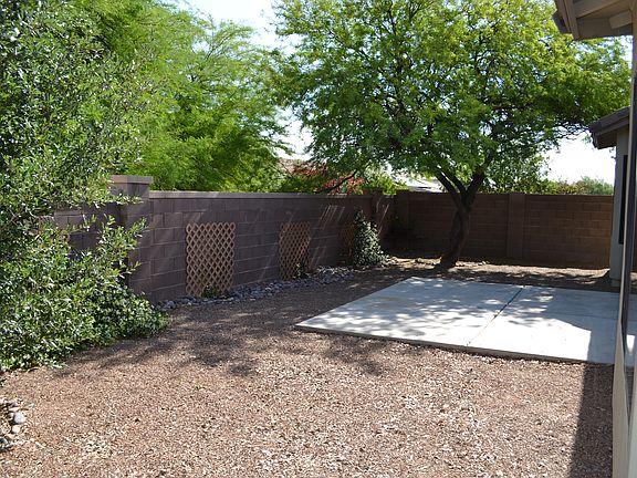 Large patio and shade trees