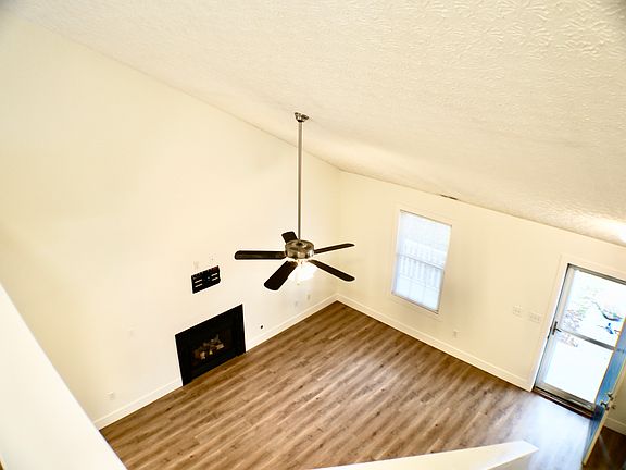 Greatroom w/High Ceilings. Gas Fireplace w/TV mount above fireplace to easliy hang your own TV