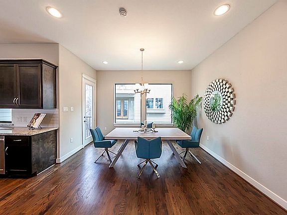 Dining room with picture window and access to the balcony!