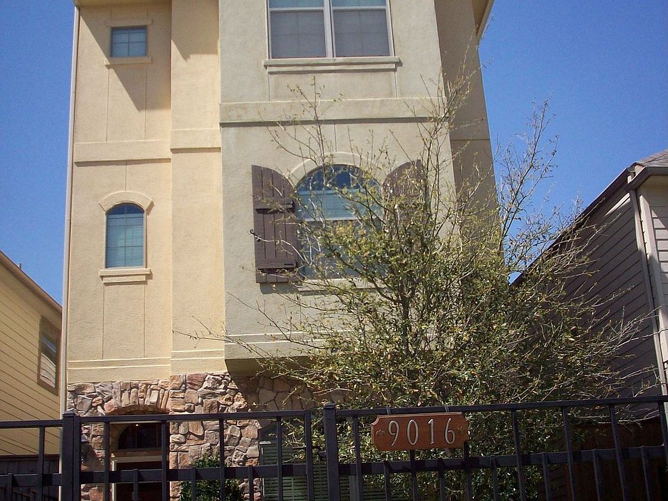 Beautiful three bedroom single family townhome with landscaped yard.