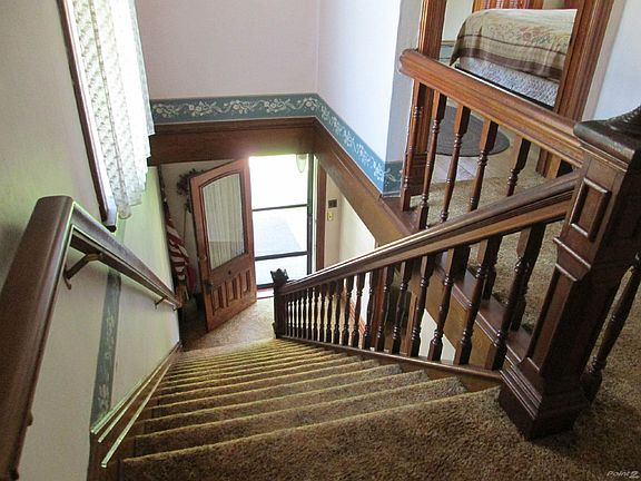 Wide Staircase with original woodwork