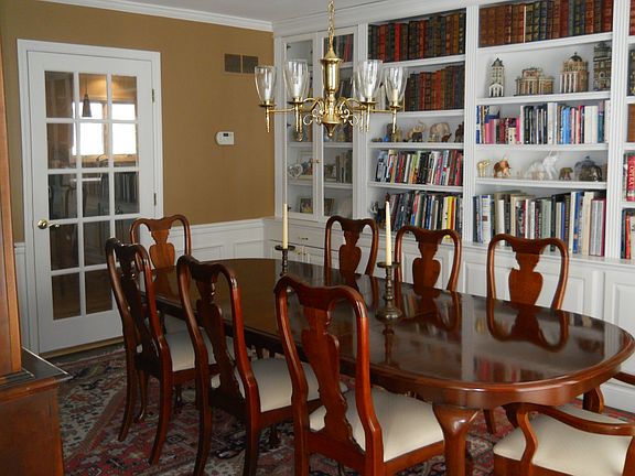 Formal dining rm with custom built-in cabinetry