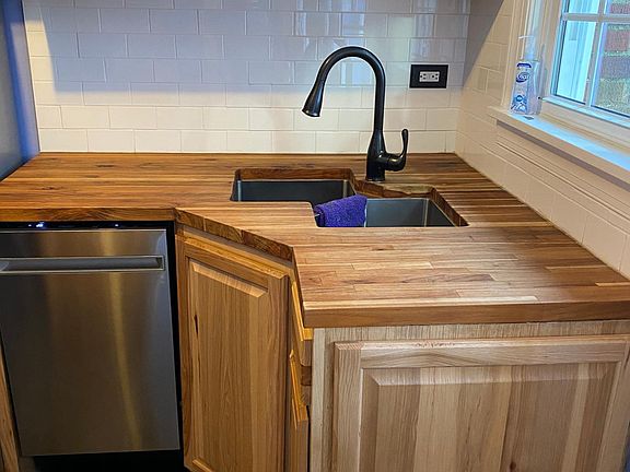 Double basin sink with window toward back yard and garage