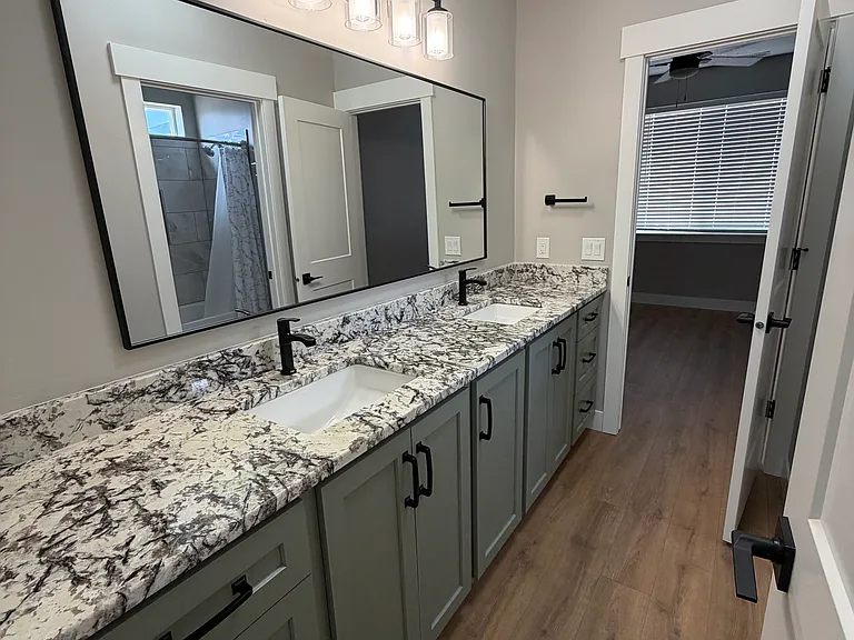 Beautiful large vanity for Shared guest bathroom.