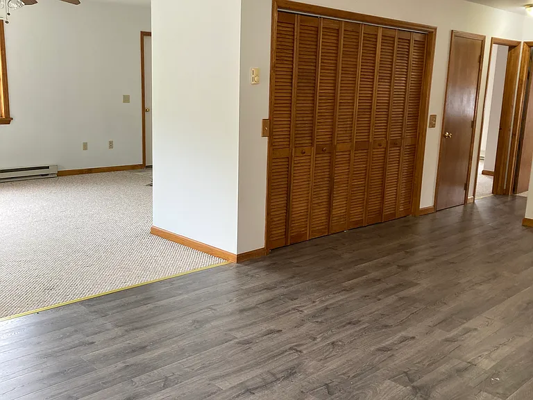 Partial view -Living-dining-kitchen
Folding doors conceal washer/dryer