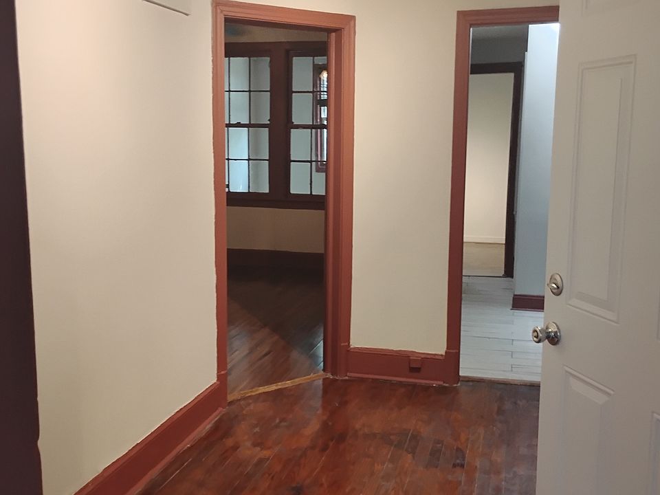 Entry from hallway with access to 2 bedrooms, bathroom, kitchen