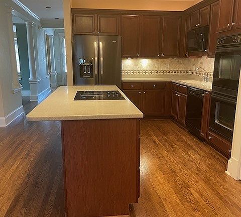 Kitchen looking from garage entry