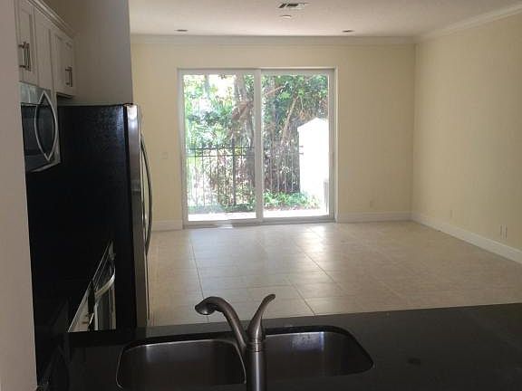 4th image of 8340 Cocoplum Sound Ln