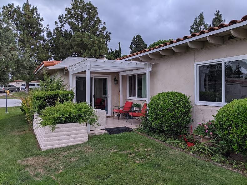 Beautiful Pergola with cover so rain doesn't come through if you want to sit out in the rain or keep furniture from getting too wet. With amazing views as well.