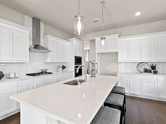 Kitchen in the Sauvignon home plan by Trophy Signature Homes