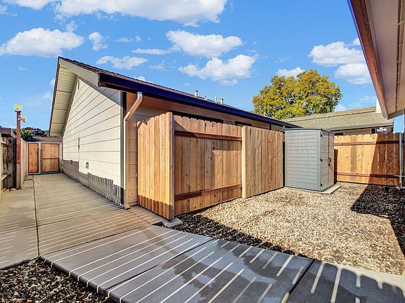 Clean, safe path of travel to front door. Lockable storage shed for added storage.